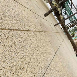 忻州 黄金麻花岗岩荔枝面外墙干挂石材效果示例