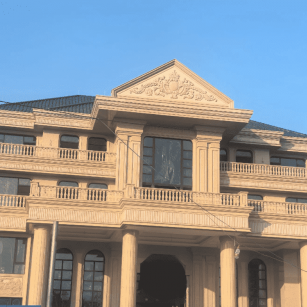 忻州黄金麻别墅外墙干挂石材效果示例