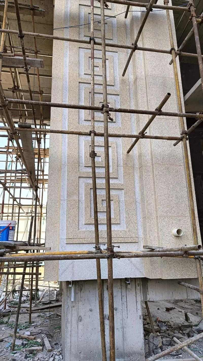 忻州 黄金麻花岗岩别墅外墙干挂回纹造型效果