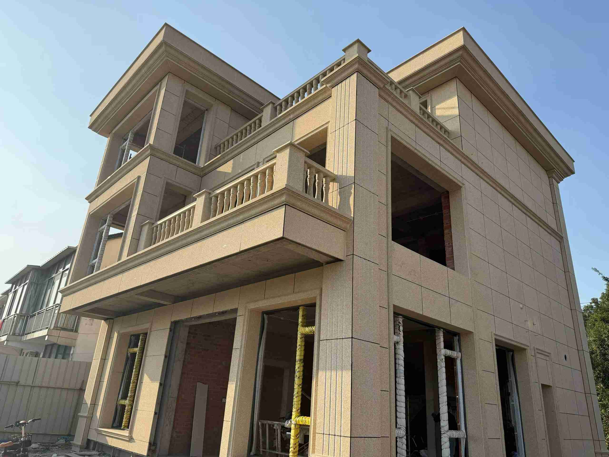 忻州 黄金麻花岗岩石材荔枝面外墙干挂效果展示